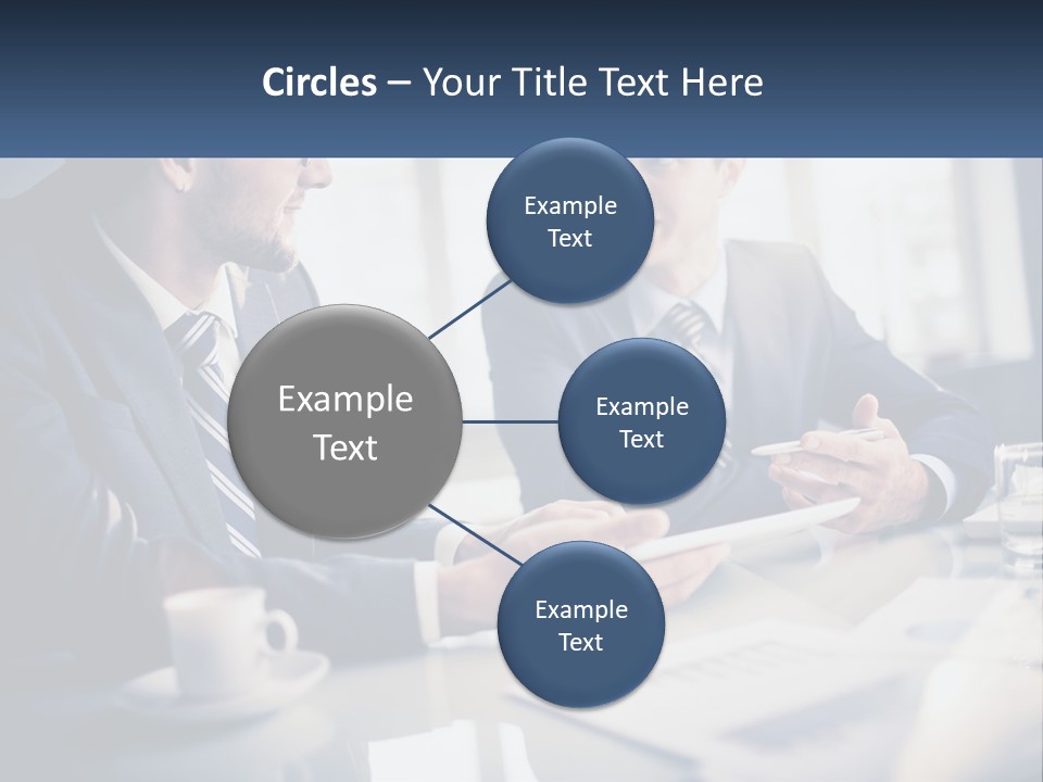 Two Men Sitting At A Table With A Tablet PowerPoint Template