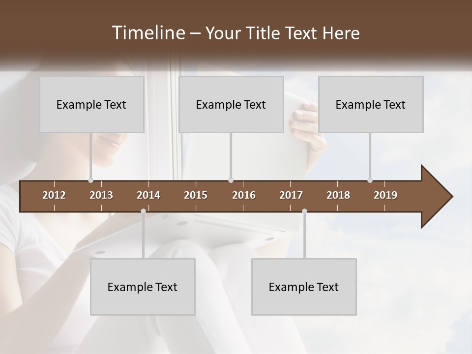 A Woman Sitting On A Window Sill Using A Laptop Computer PowerPoint Template