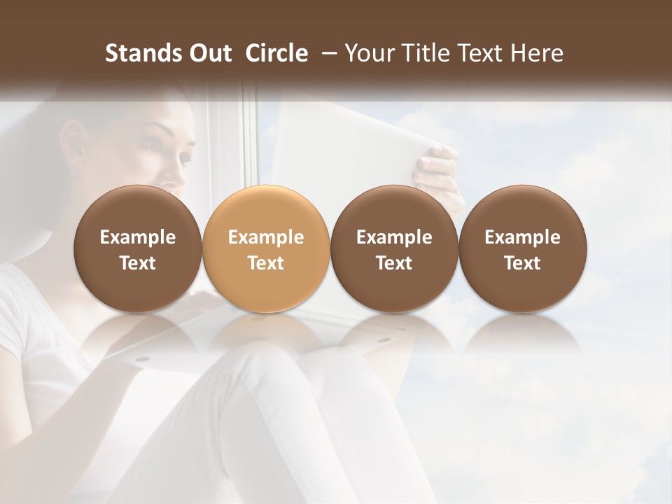 A Woman Sitting On A Window Sill Using A Laptop Computer PowerPoint Template