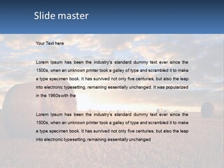 A Field With Hay Bales In The Foreground And A Sunset In The Background PowerPoint Template