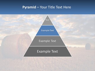 A Field With Hay Bales In The Foreground And A Sunset In The Background PowerPoint Template