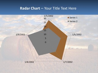 A Field With Hay Bales In The Foreground And A Sunset In The Background PowerPoint Template
