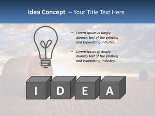 A Field With Hay Bales In The Foreground And A Sunset In The Background PowerPoint Template