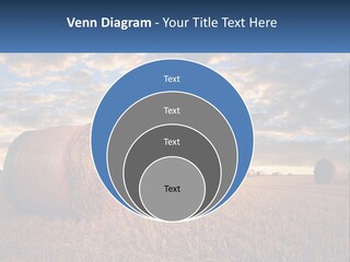 A Field With Hay Bales In The Foreground And A Sunset In The Background PowerPoint Template
