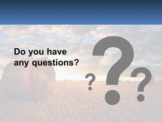 A Field With Hay Bales In The Foreground And A Sunset In The Background PowerPoint Template