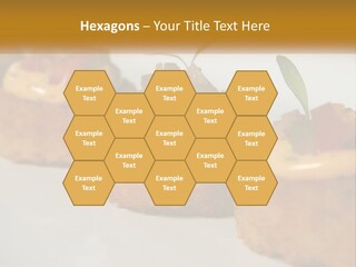 A White Plate Topped With Mini Cakes Covered In Toppings PowerPoint Template