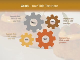 A White Plate Topped With Mini Cakes Covered In Toppings PowerPoint Template