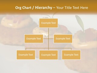 A White Plate Topped With Mini Cakes Covered In Toppings PowerPoint Template