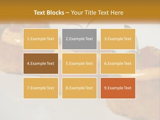 A White Plate Topped With Mini Cakes Covered In Toppings PowerPoint Template