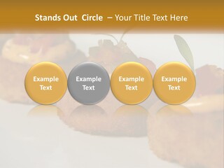 A White Plate Topped With Mini Cakes Covered In Toppings PowerPoint Template