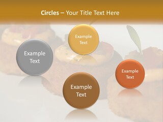 A White Plate Topped With Mini Cakes Covered In Toppings PowerPoint Template