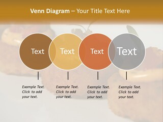 A White Plate Topped With Mini Cakes Covered In Toppings PowerPoint Template