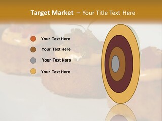 A White Plate Topped With Mini Cakes Covered In Toppings PowerPoint Template