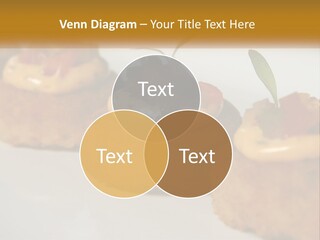 A White Plate Topped With Mini Cakes Covered In Toppings PowerPoint Template