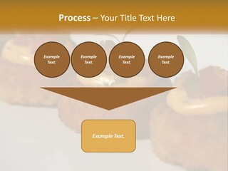 A White Plate Topped With Mini Cakes Covered In Toppings PowerPoint Template