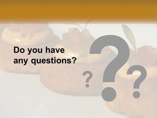 A White Plate Topped With Mini Cakes Covered In Toppings PowerPoint Template