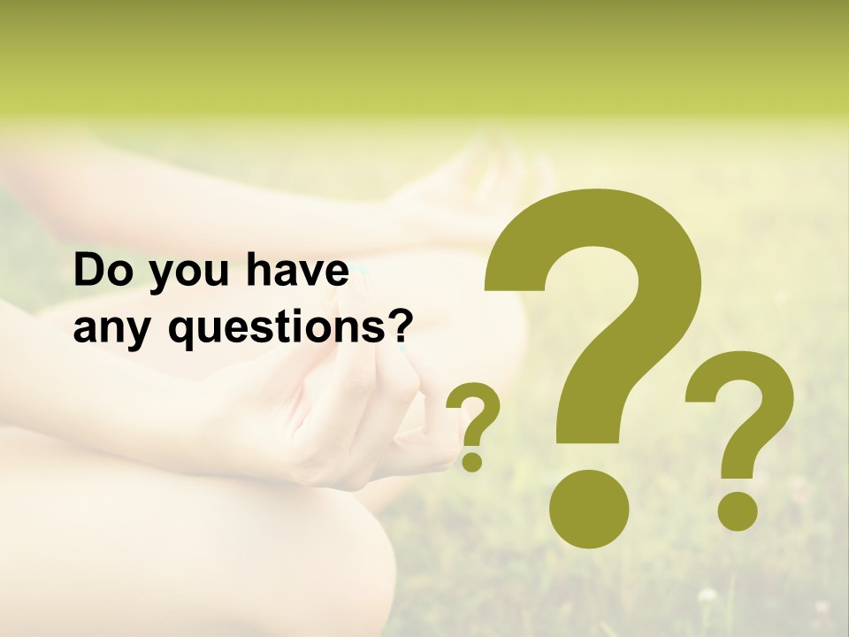 A Woman Is Sitting In The Grass Doing Yoga PowerPoint Template