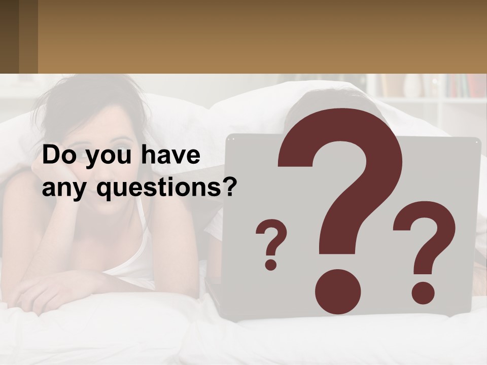 A Woman Laying In Bed Next To A Laptop Computer PowerPoint Template