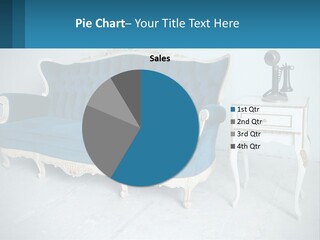 A Blue Couch Sitting Next To A White Table PowerPoint Template