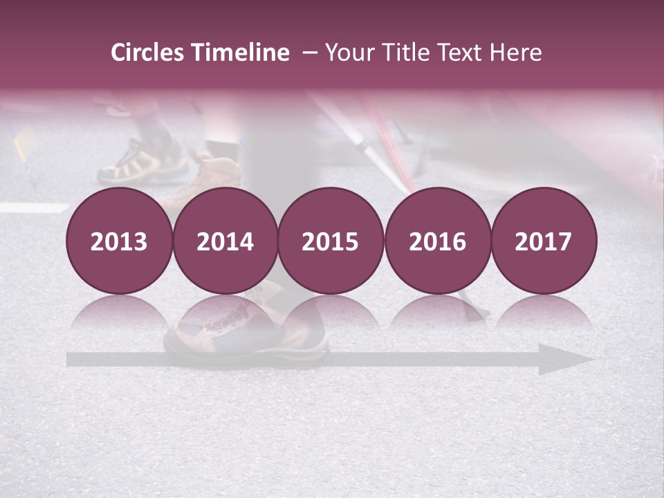 A Group Of People Walking Across A Street PowerPoint Template