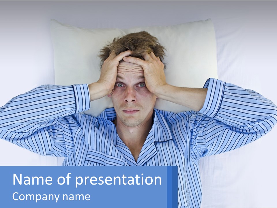 A Man Covering His Eyes While Laying In Bed PowerPoint Template