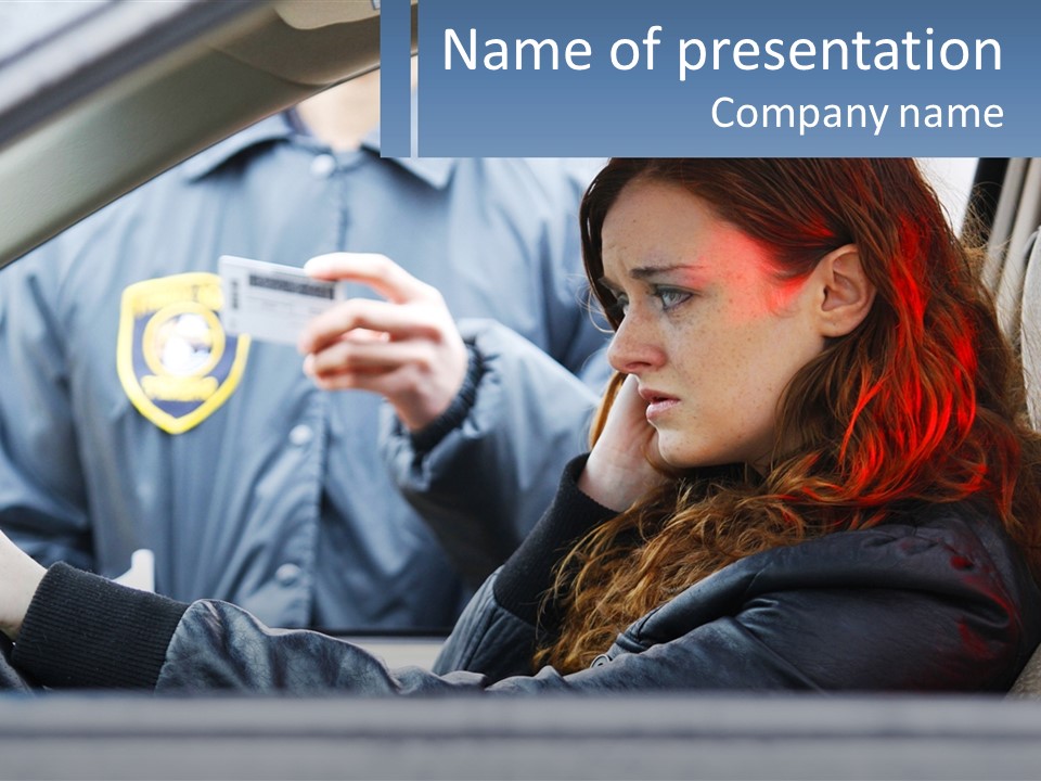 A Woman Sitting In A Car Holding A Cell Phone PowerPoint Template
