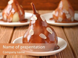 A Plate With Three Pieces Of Chocolate Covered Pears PowerPoint Template
