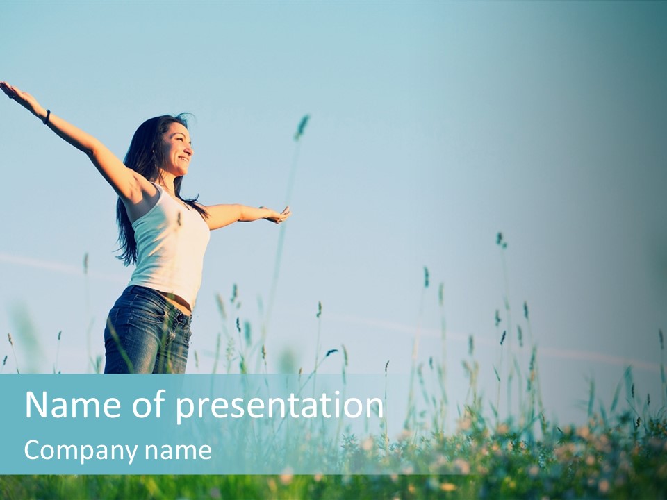 A Woman Standing In A Field With Her Arms Outstretched PowerPoint Template