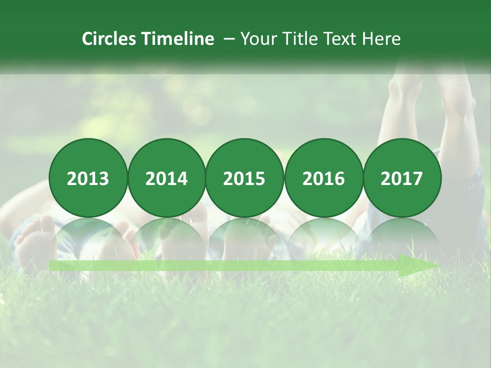 A Group Of People Laying On Top Of A Lush Green Field PowerPoint Template