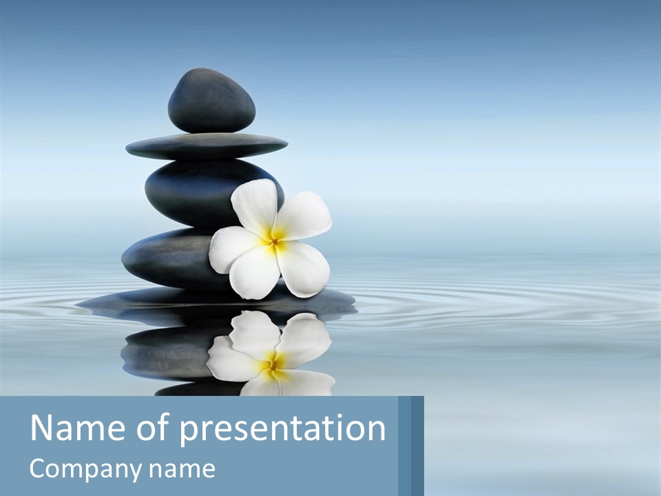 A Stack Of Rocks With Flowers On Top Of It PowerPoint Template