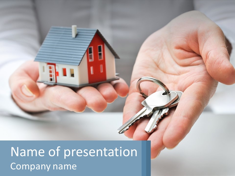 A Person Holding A House Key In Their Hands PowerPoint Template