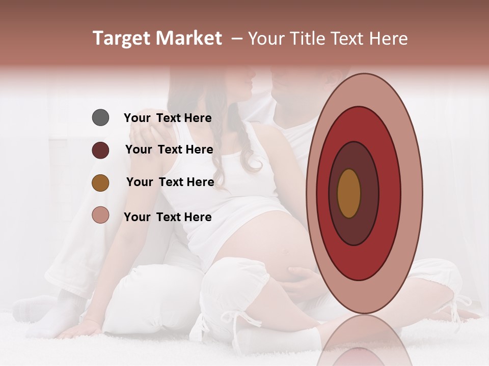 A Pregnant Couple Sitting On A Bed Together PowerPoint Template