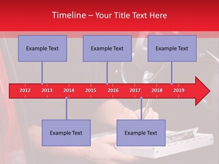 A Man Sitting In A Red Car Writing On A Clipboard PowerPoint Template