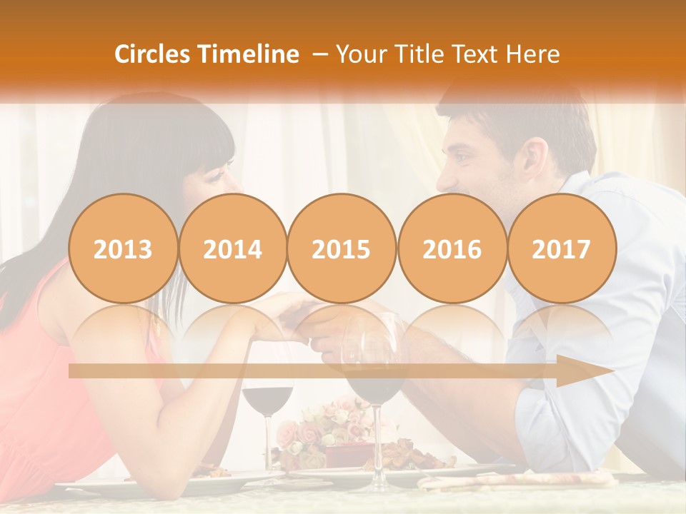 A Man And Woman Sitting At A Table With A Glass Of Wine PowerPoint Template