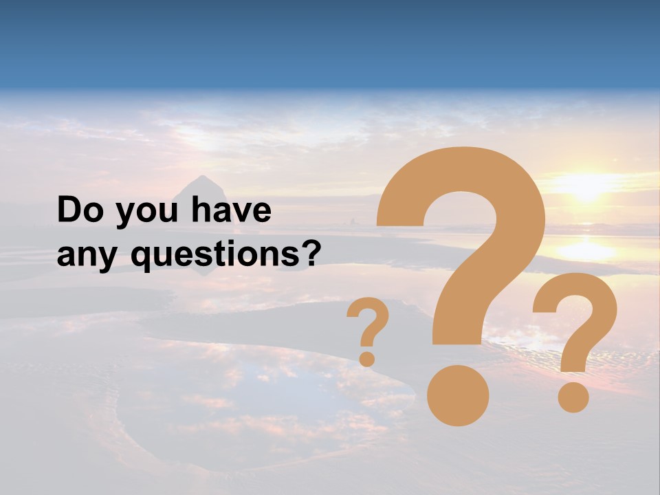 A Beautiful Sunset Over The Ocean With Rocks In The Background PowerPoint Template