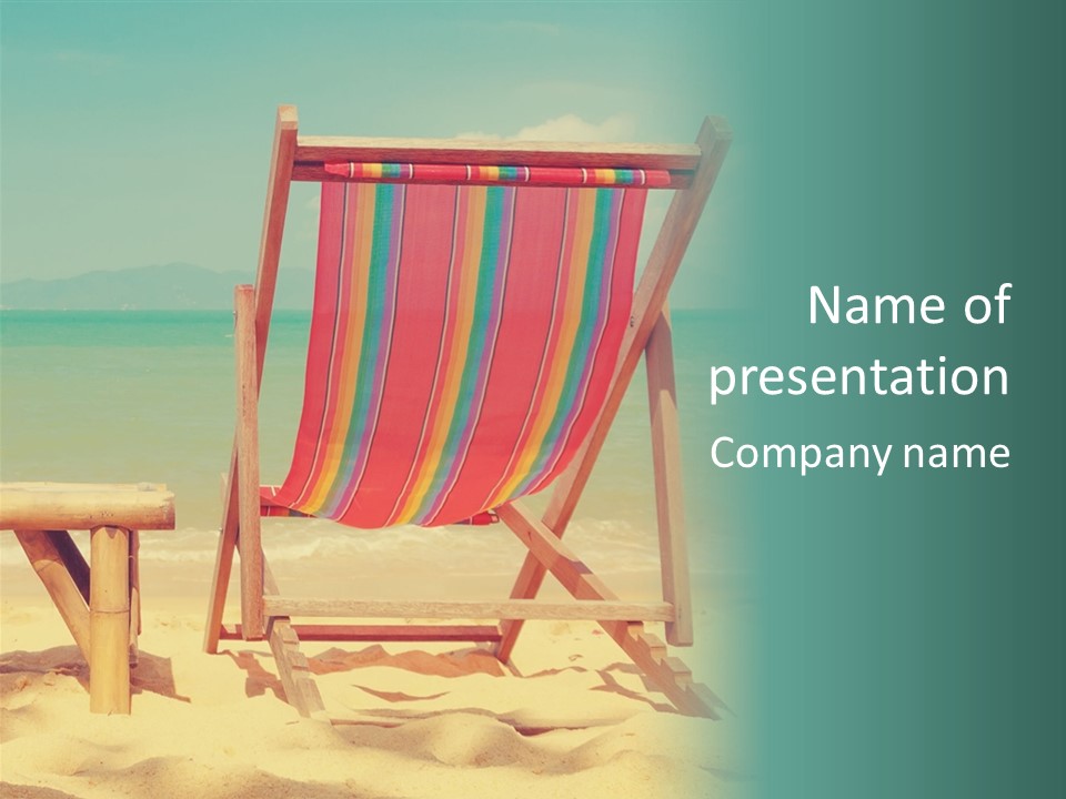 A Colorful Beach Chair Sitting On Top Of A Sandy Beach PowerPoint Template
