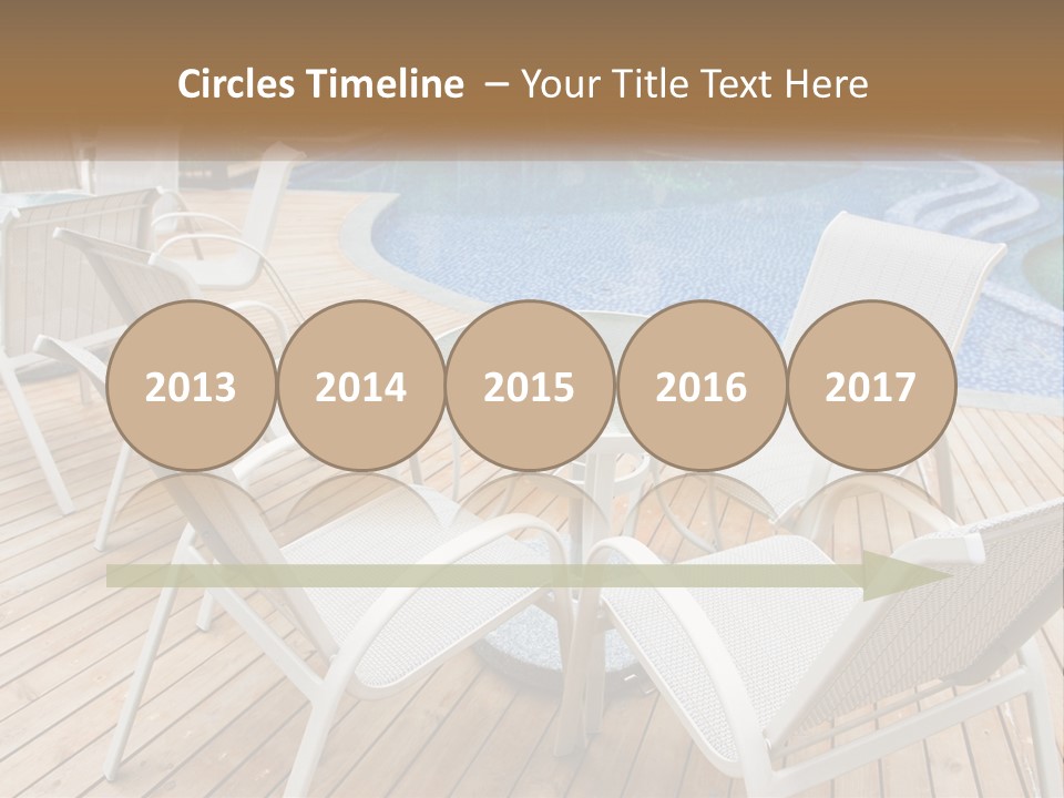 A Table And Chairs Near A Swimming Pool PowerPoint Template
