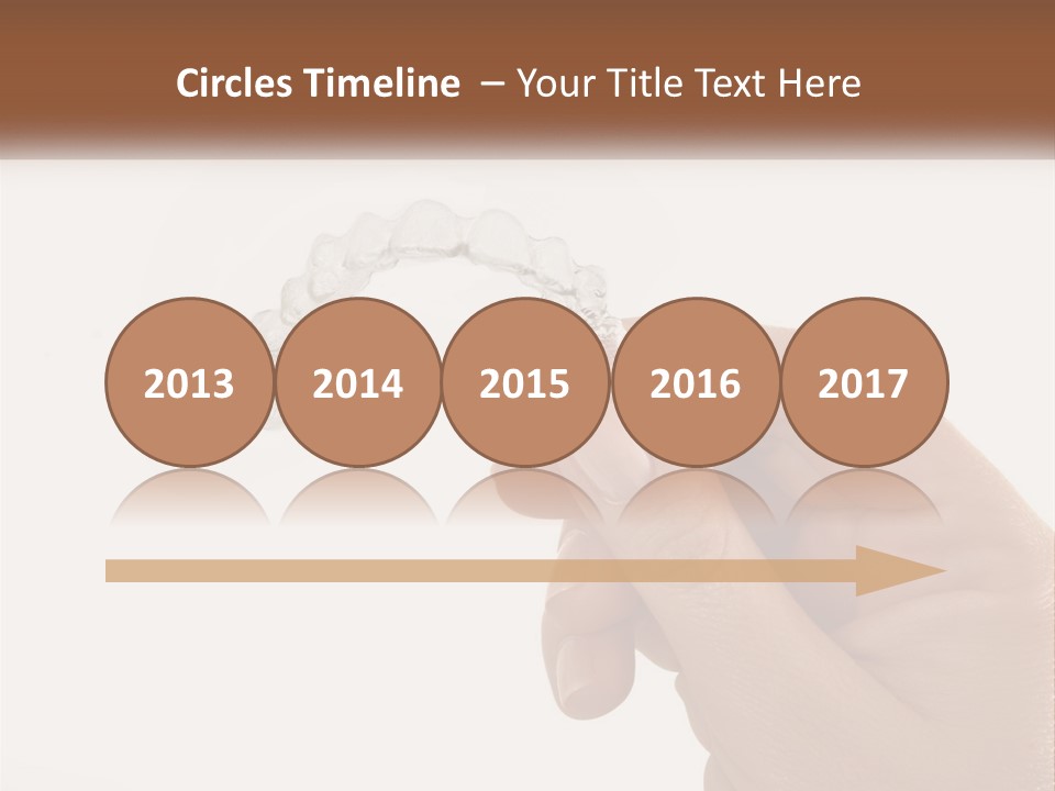 A Person Holding A Toothbrush In Their Hand PowerPoint Template