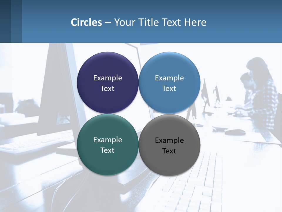 A Man Sitting In Front Of A Computer Monitor PowerPoint Template