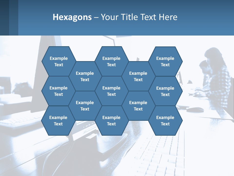 A Man Sitting In Front Of A Computer Monitor PowerPoint Template