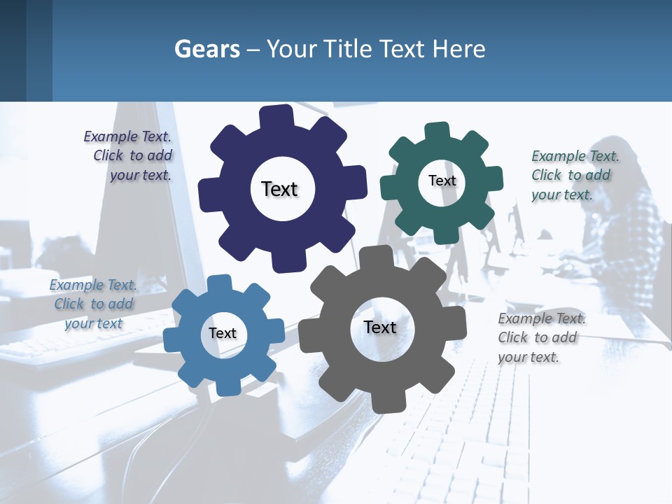 A Man Sitting In Front Of A Computer Monitor PowerPoint Template