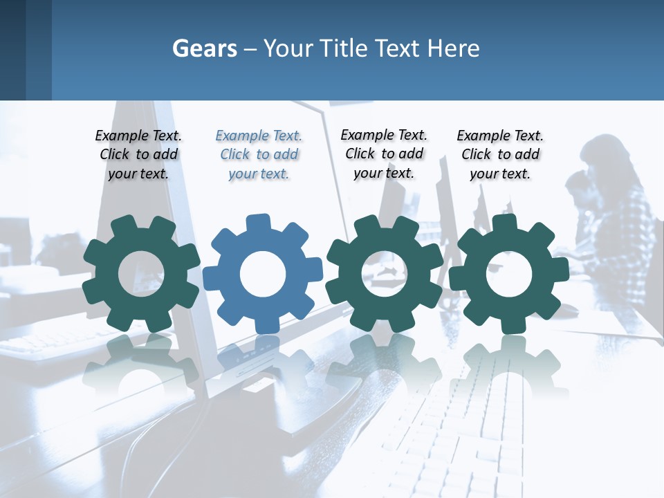 A Man Sitting In Front Of A Computer Monitor PowerPoint Template