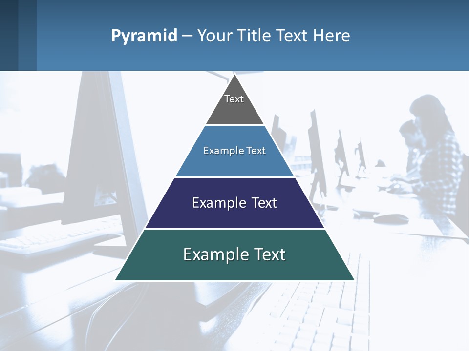 A Man Sitting In Front Of A Computer Monitor PowerPoint Template