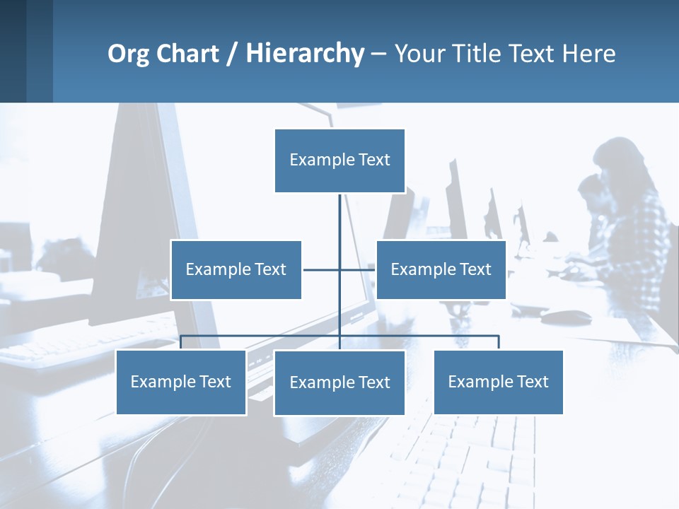 A Man Sitting In Front Of A Computer Monitor PowerPoint Template