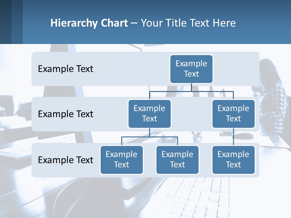 A Man Sitting In Front Of A Computer Monitor PowerPoint Template