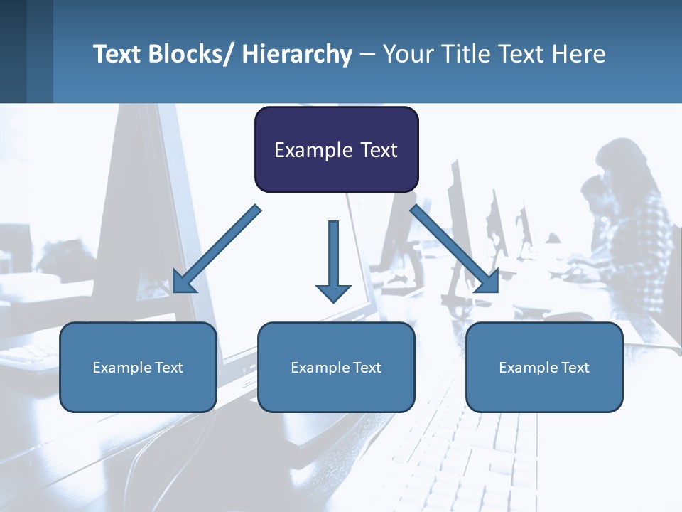 A Man Sitting In Front Of A Computer Monitor PowerPoint Template