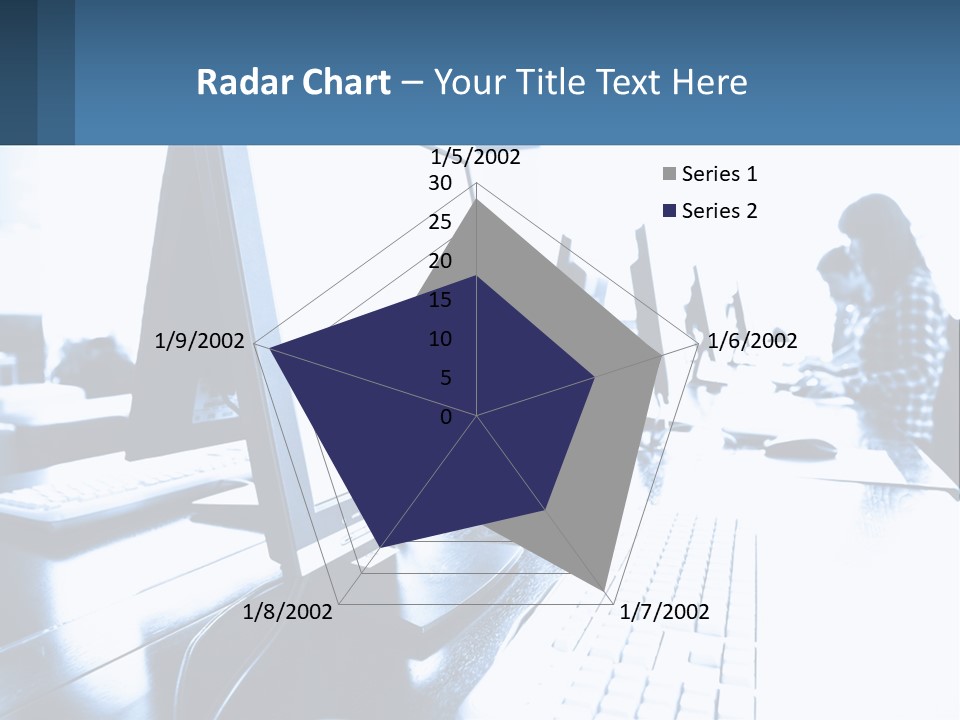 A Man Sitting In Front Of A Computer Monitor PowerPoint Template