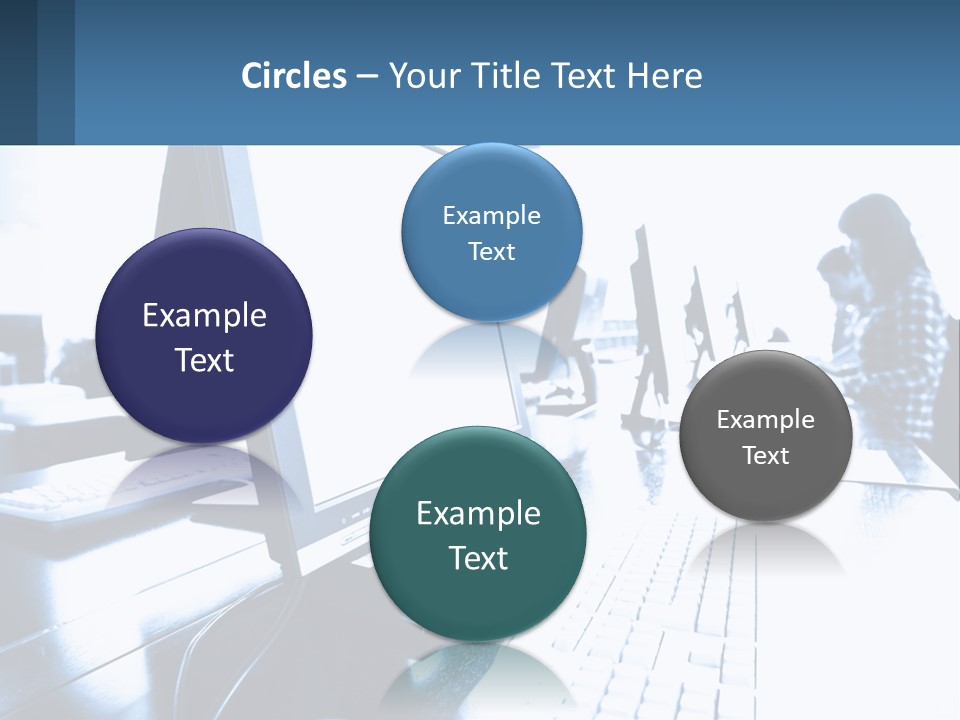 A Man Sitting In Front Of A Computer Monitor PowerPoint Template