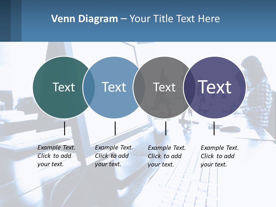 A Man Sitting In Front Of A Computer Monitor PowerPoint Template