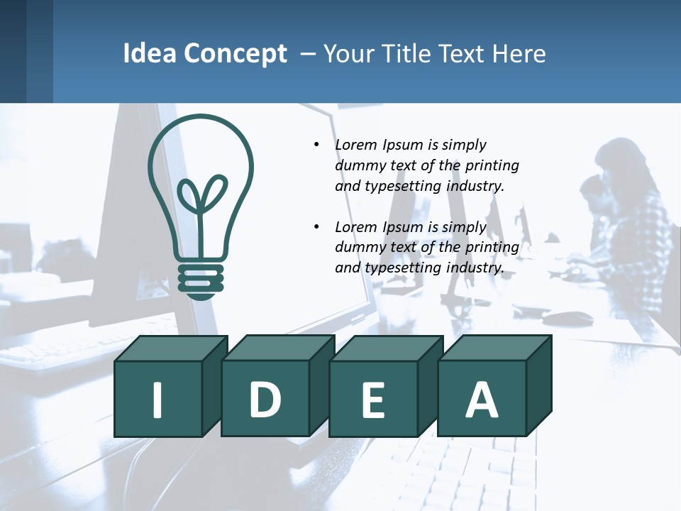 A Man Sitting In Front Of A Computer Monitor PowerPoint Template